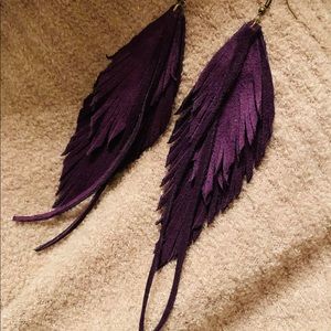 Genuine leather feather earrings. Handmade.